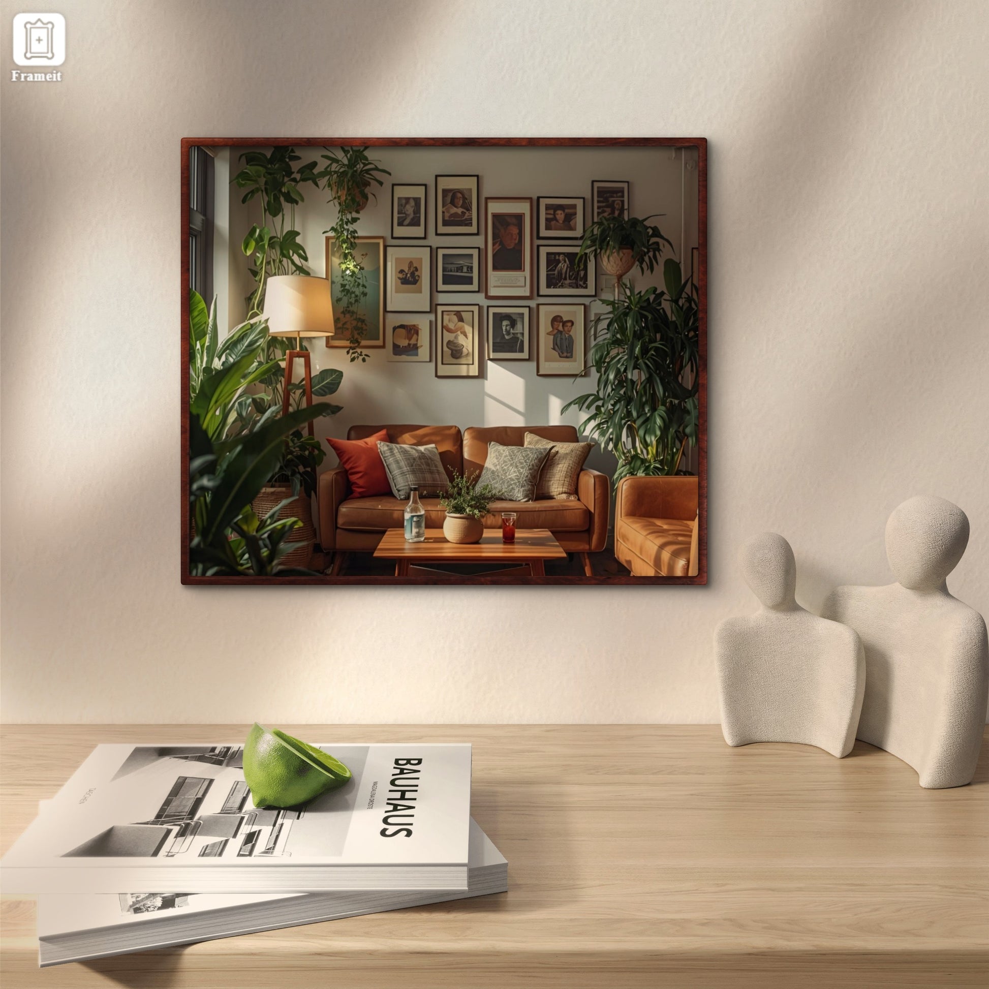 Framed artwork of a living room with a couch, coffee table, and decorative items.