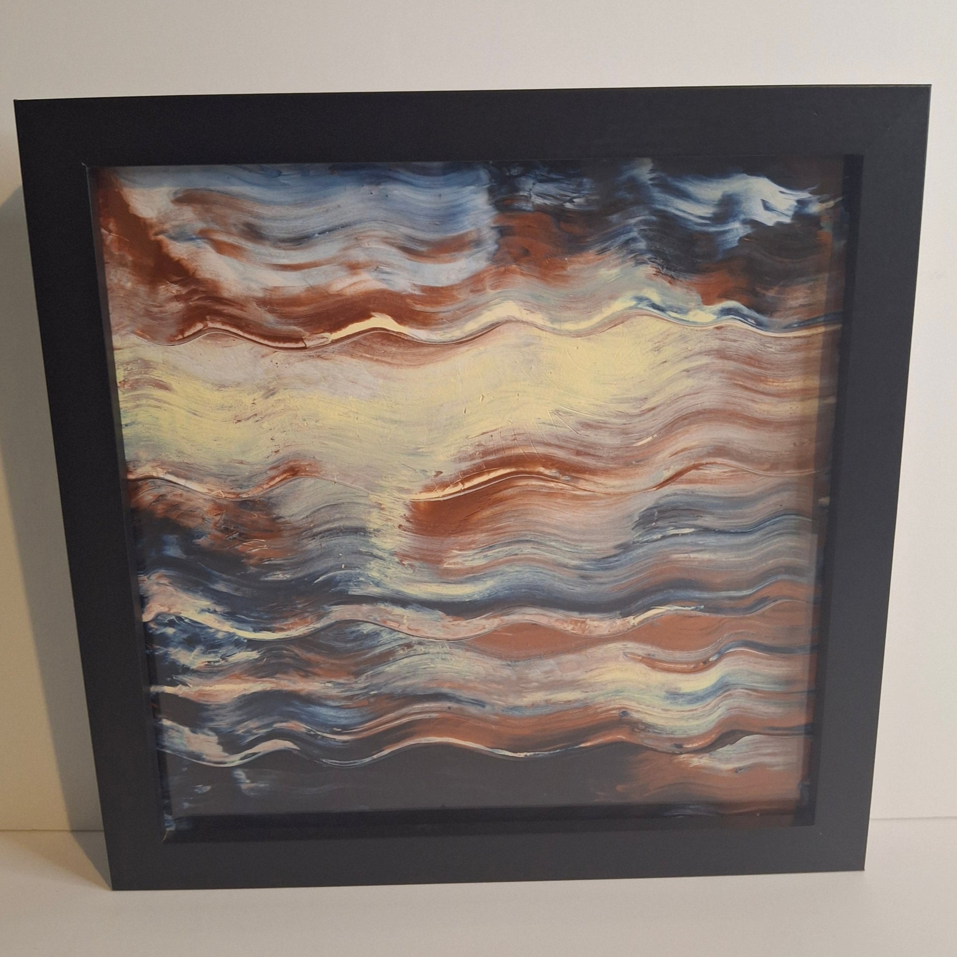 Framed abstract artwork titled Event Horizon by Elizabeth Marshall featuring flowing, wave-like strokes in ochre, rust, cream and indigo tones, suggesting cosmic motion and layered depth. Part of the Time and Space collection.