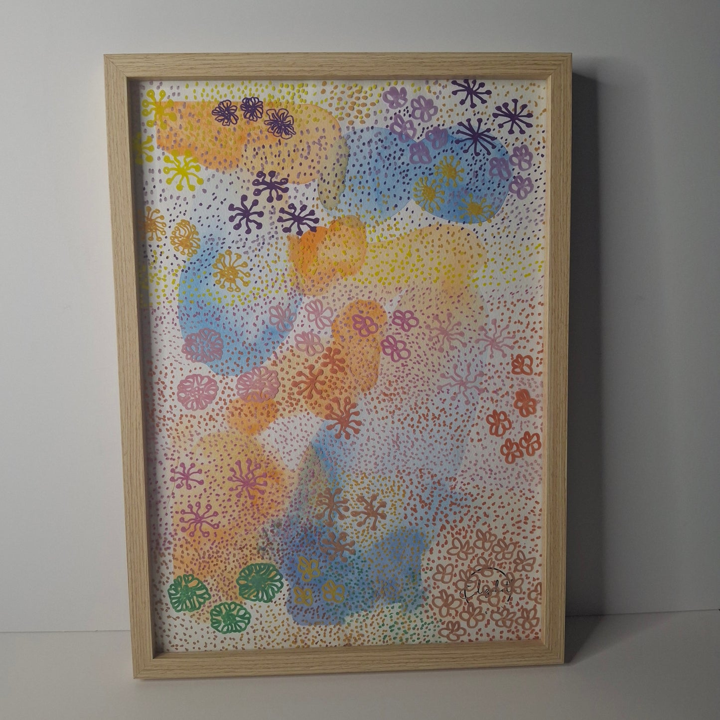 Garden Party by Elizabeth Marshall – colourful abstract floral artwork in watercolour and pen, framed in light timber, featuring blossoms and dotted textures