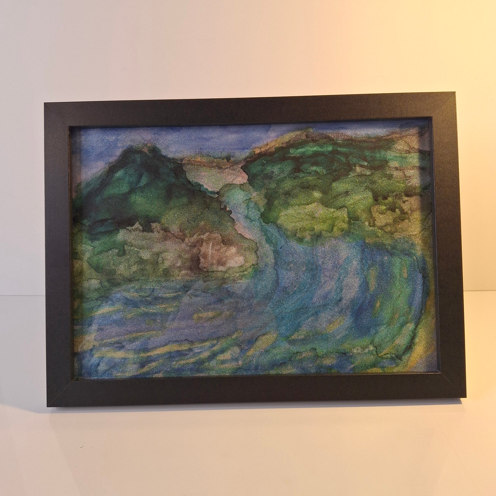 Alcohol ink artwork of a river flowing from the Southern Alps through Otago hills into the ocean in green and blue tones