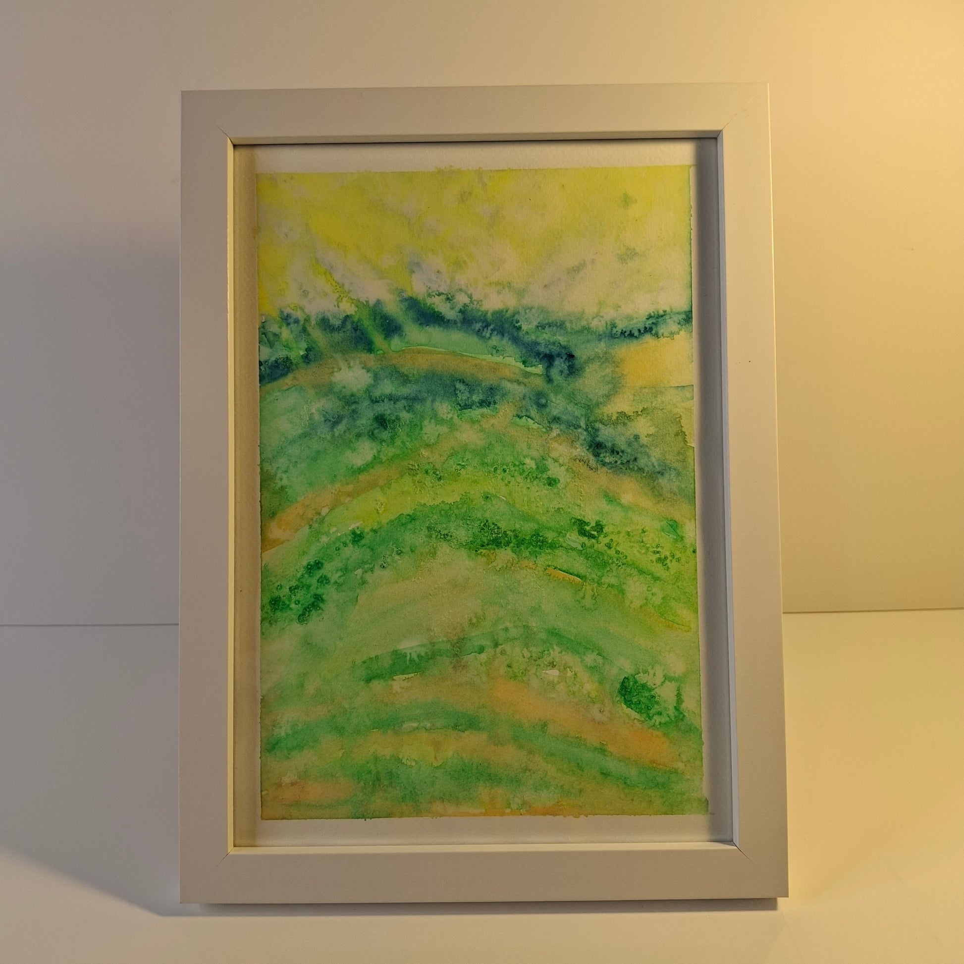 Original watercolour artwork titled ‘Where Joy Grows – Otago’, part of the My Country series by Elizabeth Marshall, showing layered hills in calming green tones.